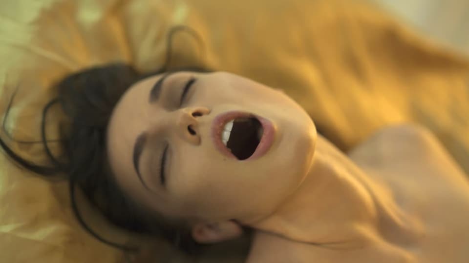 Tvář ženy při orgasmu